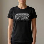 Boombox t-shirt in black, worn by a woman, front view of the chrome stereo graphic.