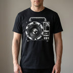 Ghettoblaster t-shirt in black, worn by a man, front view of the single-speaker chrome radio graphic.