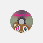 Graduation coaster with a brown bear face, pink title and printed CD center.