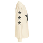 Ye Live at SoFi long sleeve in Ecru, right sleeve with three oversized charcoal stars